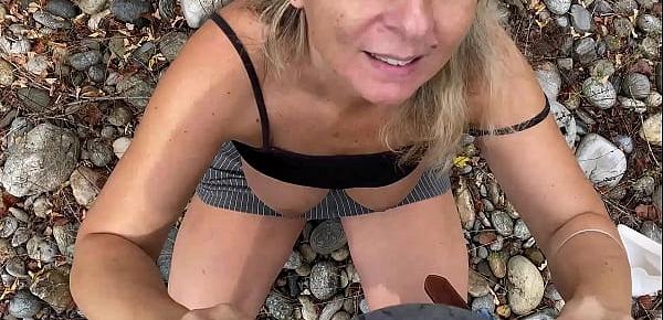  Busty MILF almost caught while fucking by the river
